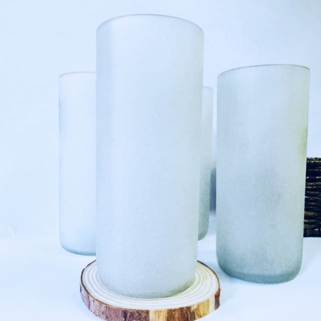Four frosted clear tall glasses