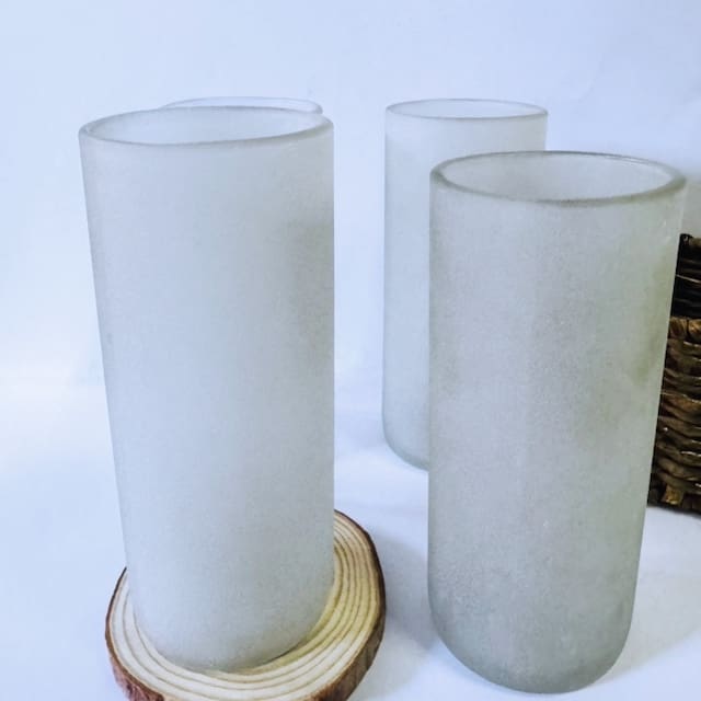 Four frosted clear tall glasses