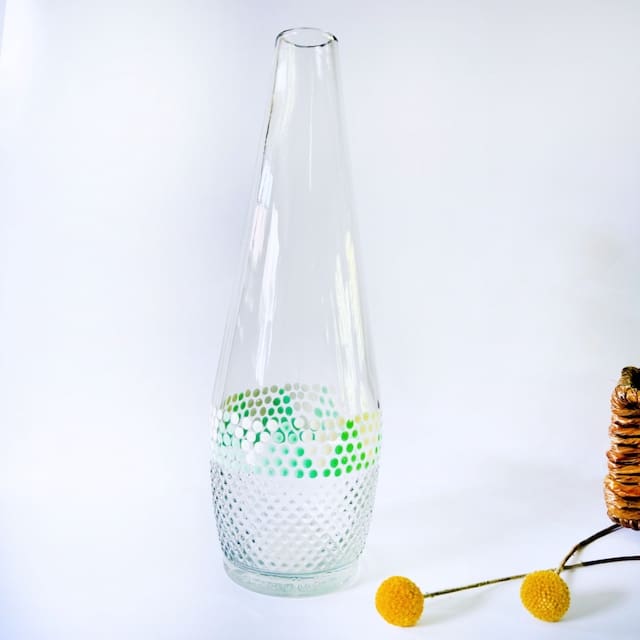 Tall nederburg glass vase with sea green + white